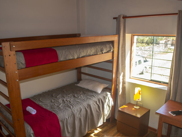 Dormitorio x 4 in Pirwa Urubamba Eco Hostel, habitación de 4 camas 